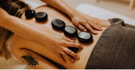Aromatherapy Back, Neck &
  Shoulder + Hot Stones